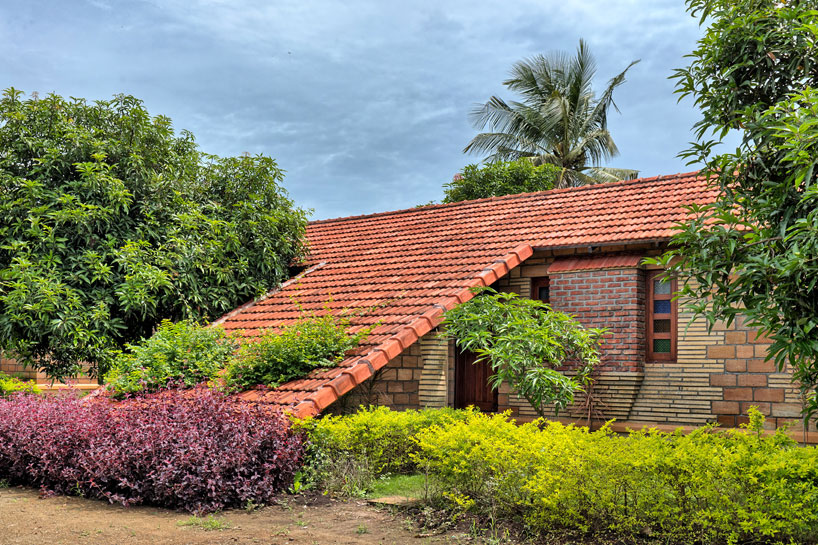 Strong element of rural Indian architecture- Terracotta tiled roof forms a distinctive presence yet blended into the landscape