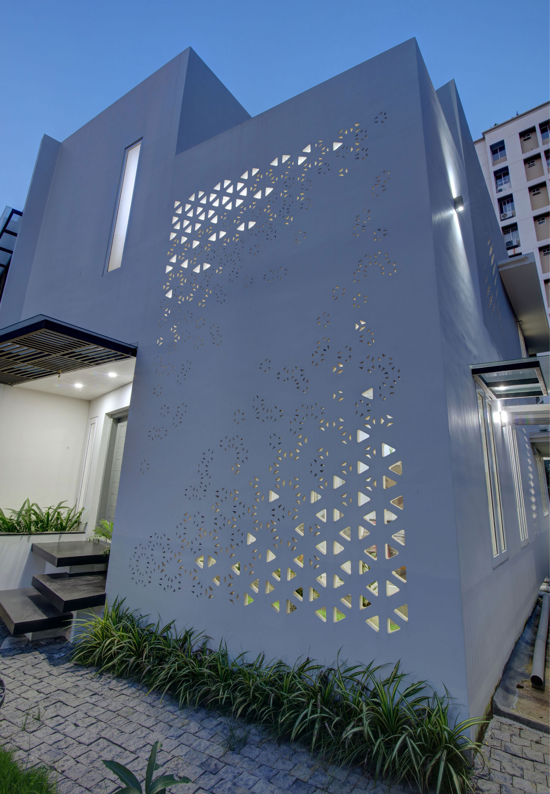 The custom designed screen wall with perforations.