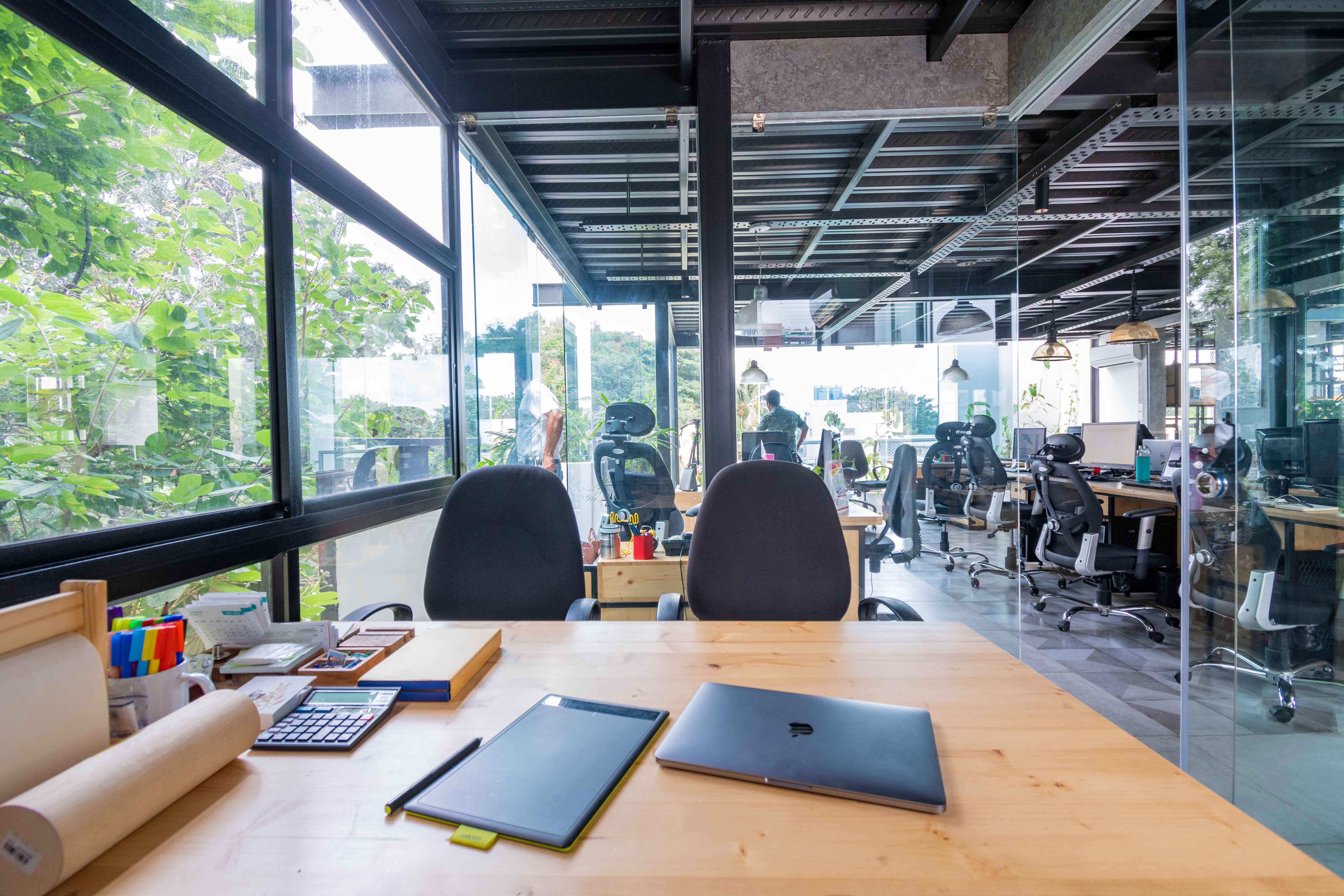 Using glass partitions in the office is one of the best ways to let in adequate natural light.