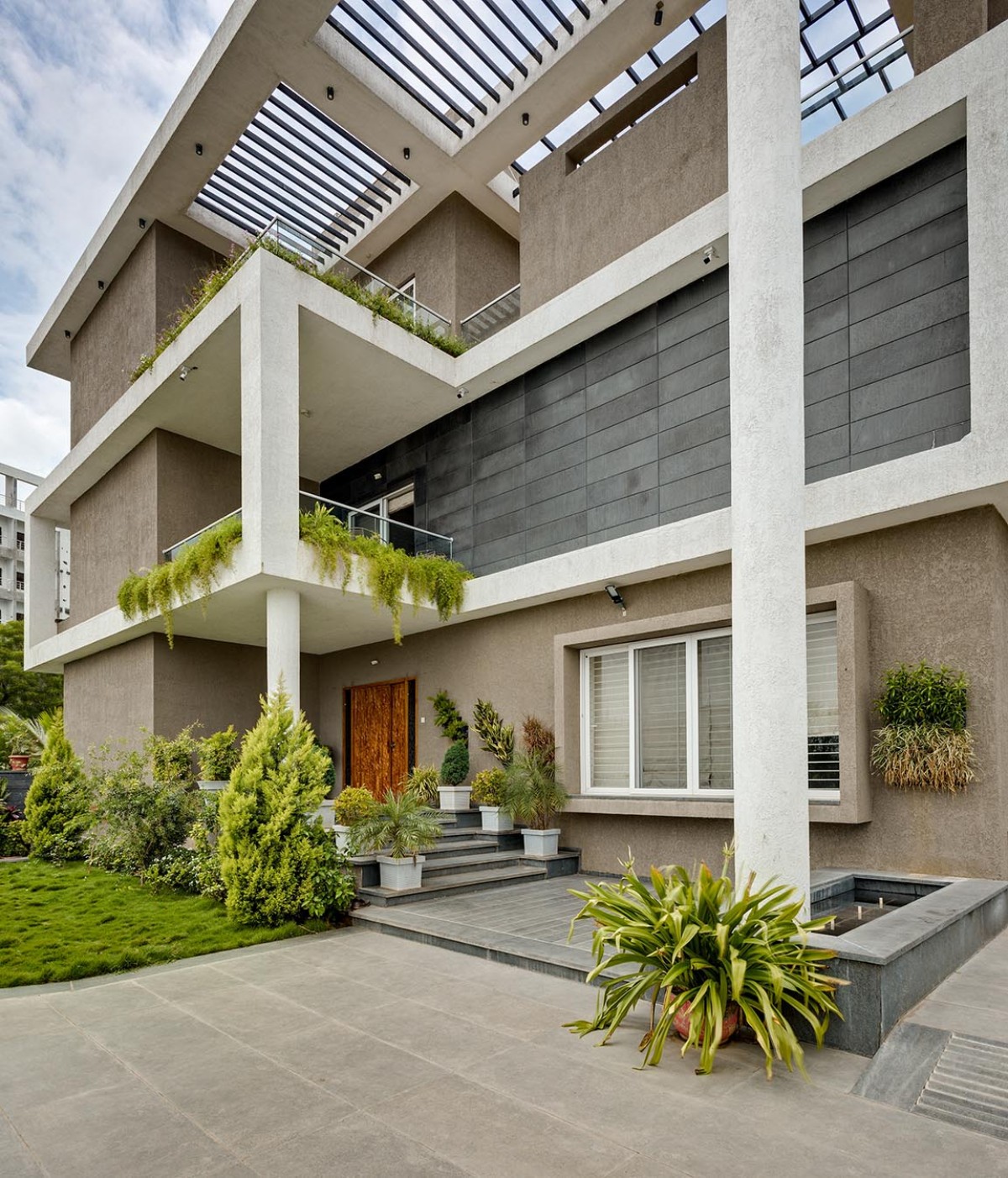 Exterior View Of Hambarde Residence by 4th Axis Design Studio