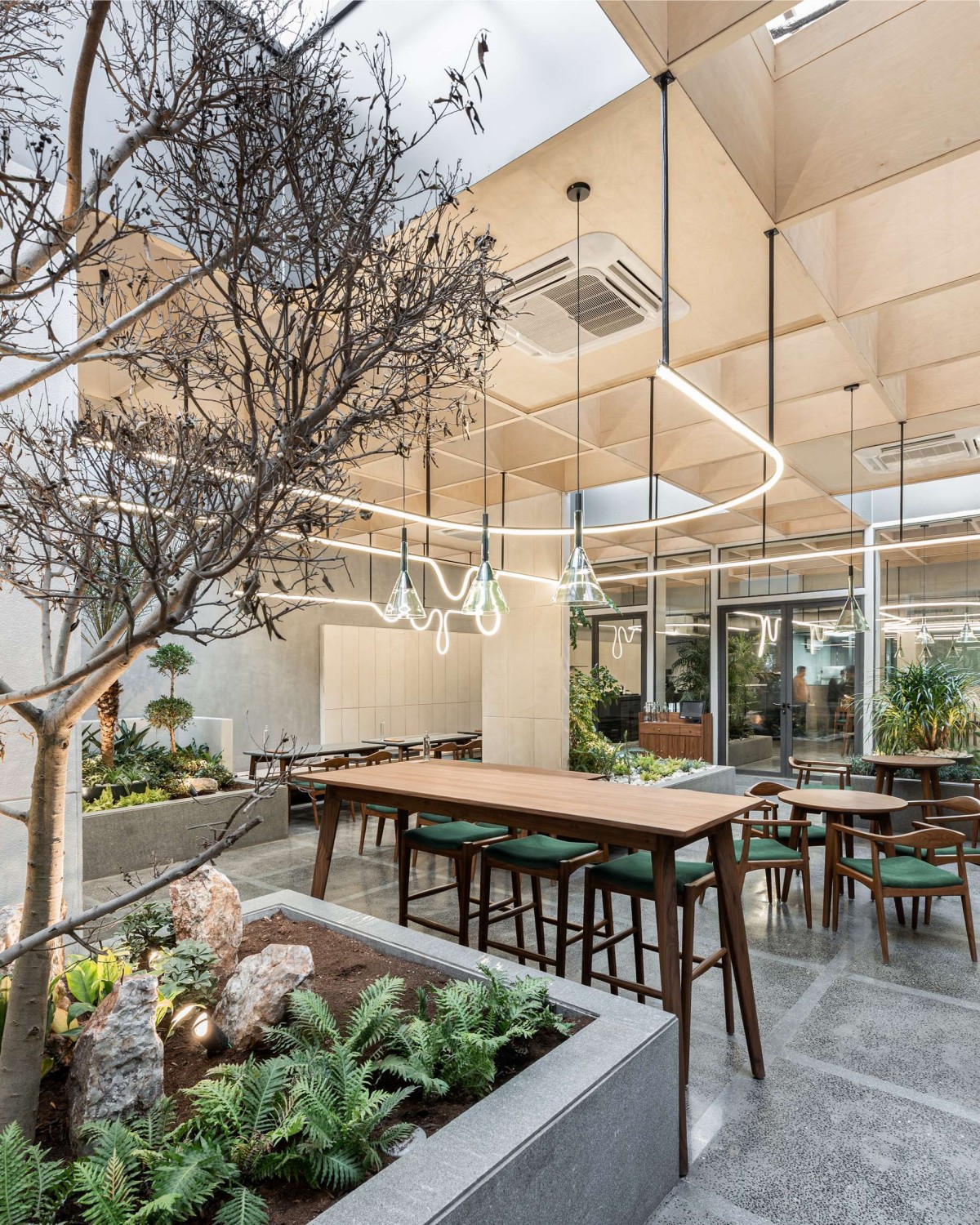 Interior view of BEIGE Café & Bakery by Arch.Lab