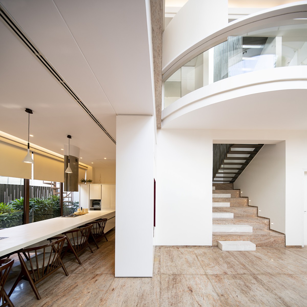 Dining and Staircase view of Residence 568 by Charged Voids