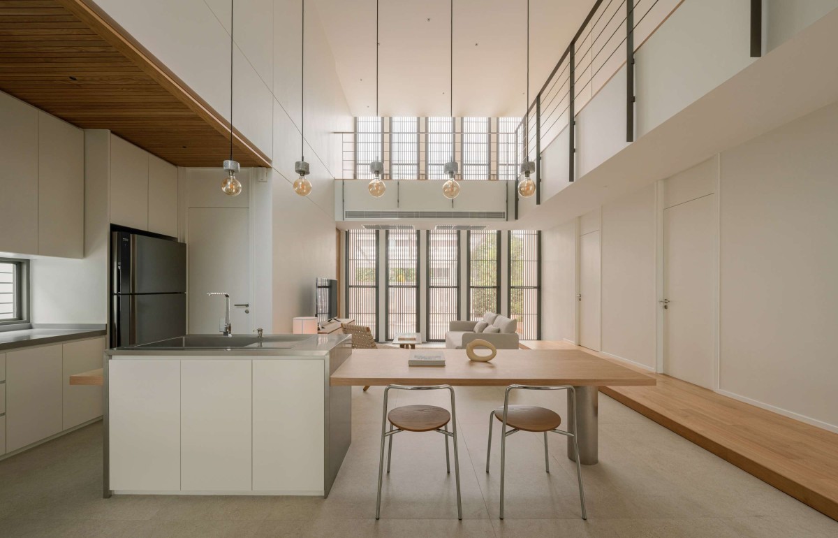Dining and Kitchen of Masook House by Studio PATH