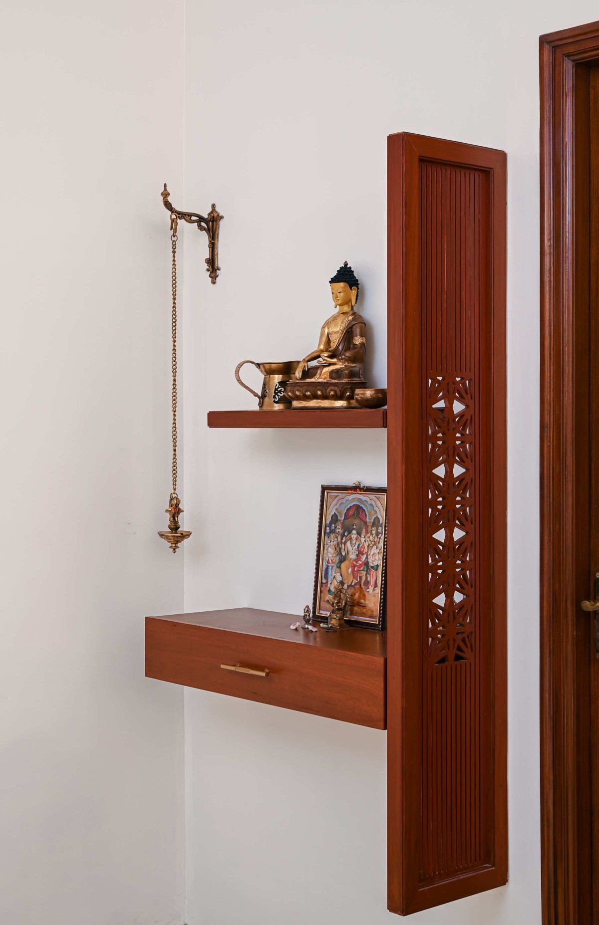 Pooja room of Brick and Jade by Kinaaya Design Studio