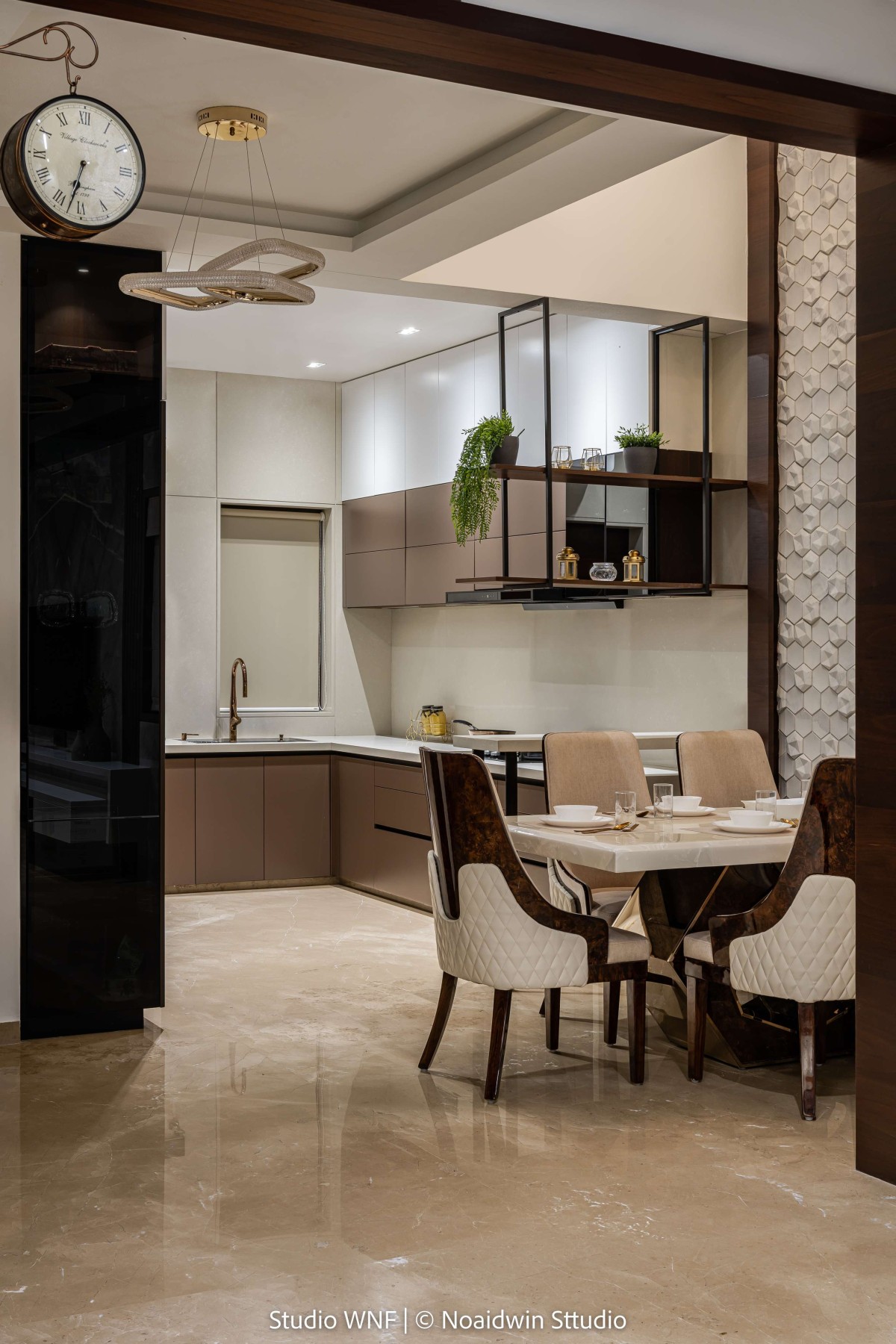 Dining and Kitchen of Aakash by Studio WnF