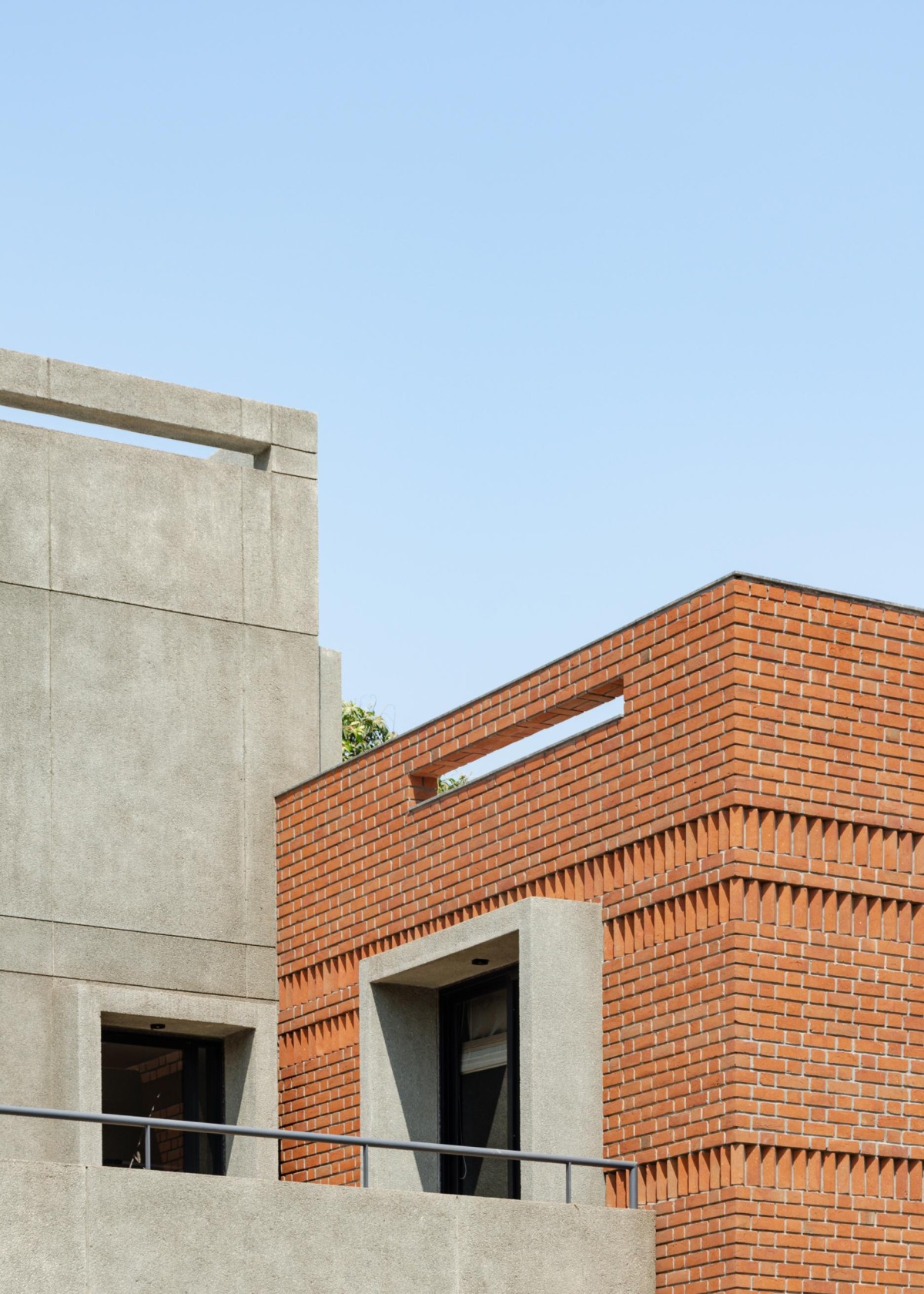 Detailed shot of exterior view of Chitrakut - An Extended Family Cluster (Faliyu) by Aangan Architects