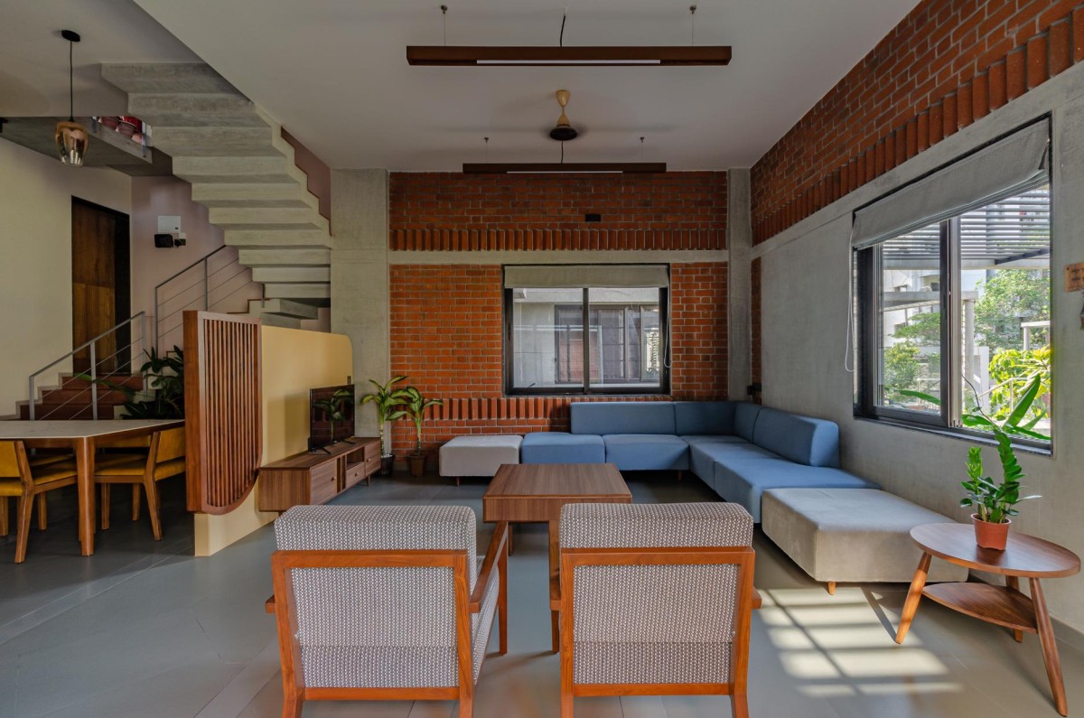 Living and Dining of Chitrakut - An Extended Family Cluster (Faliyu) by Aangan Architects