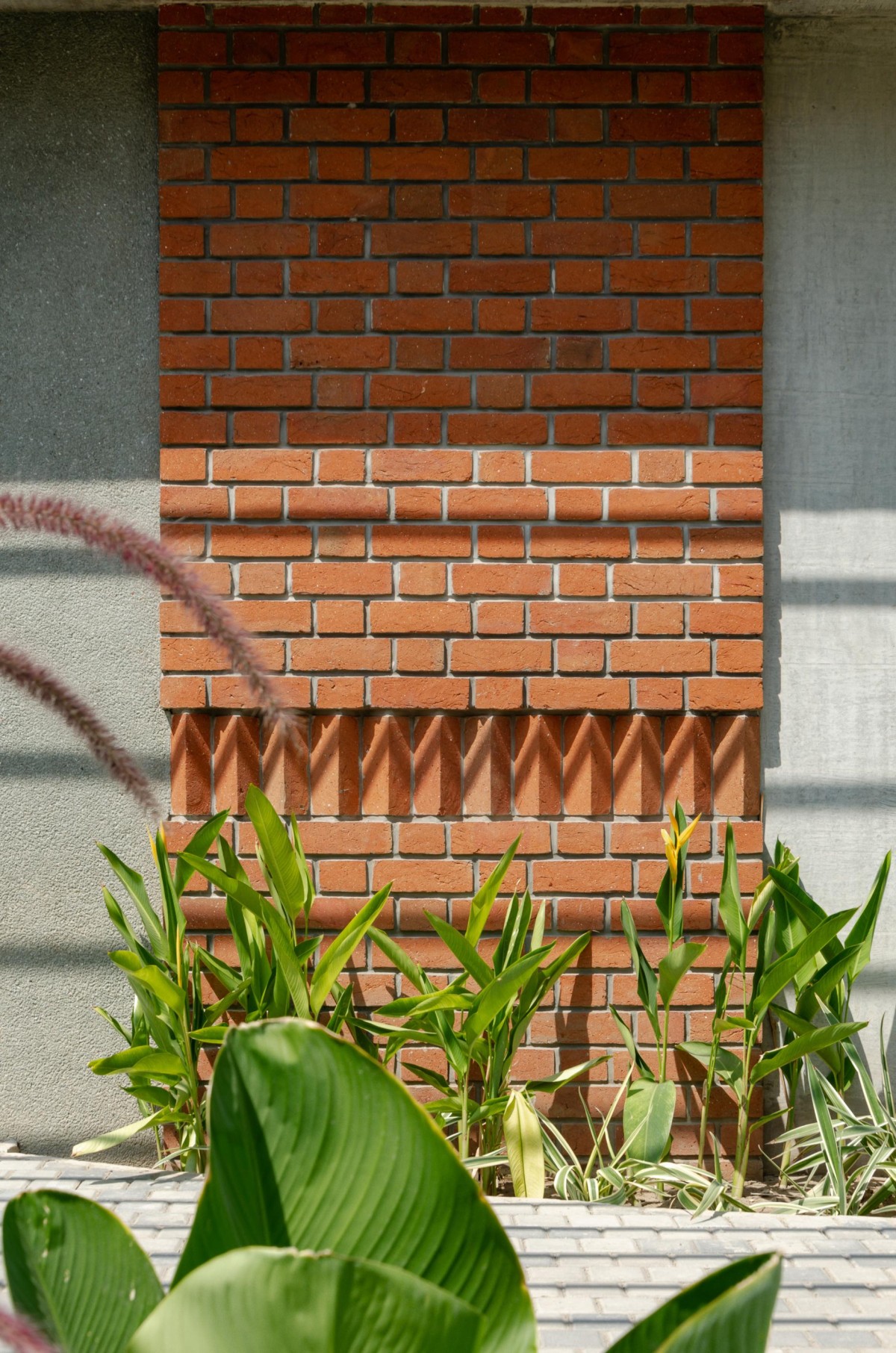 Detailes shot of brick wall of Chitrakut - An Extended Family Cluster (Faliyu) by Aangan Architects