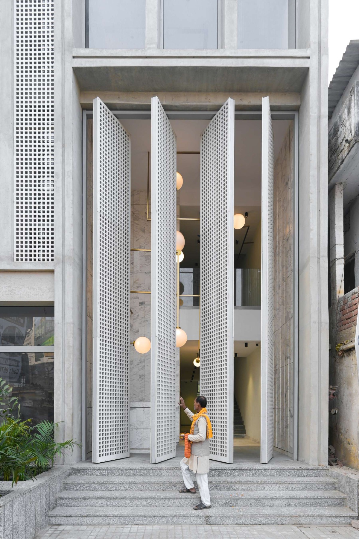 Exterior view of Veiled Building by KUN Studio