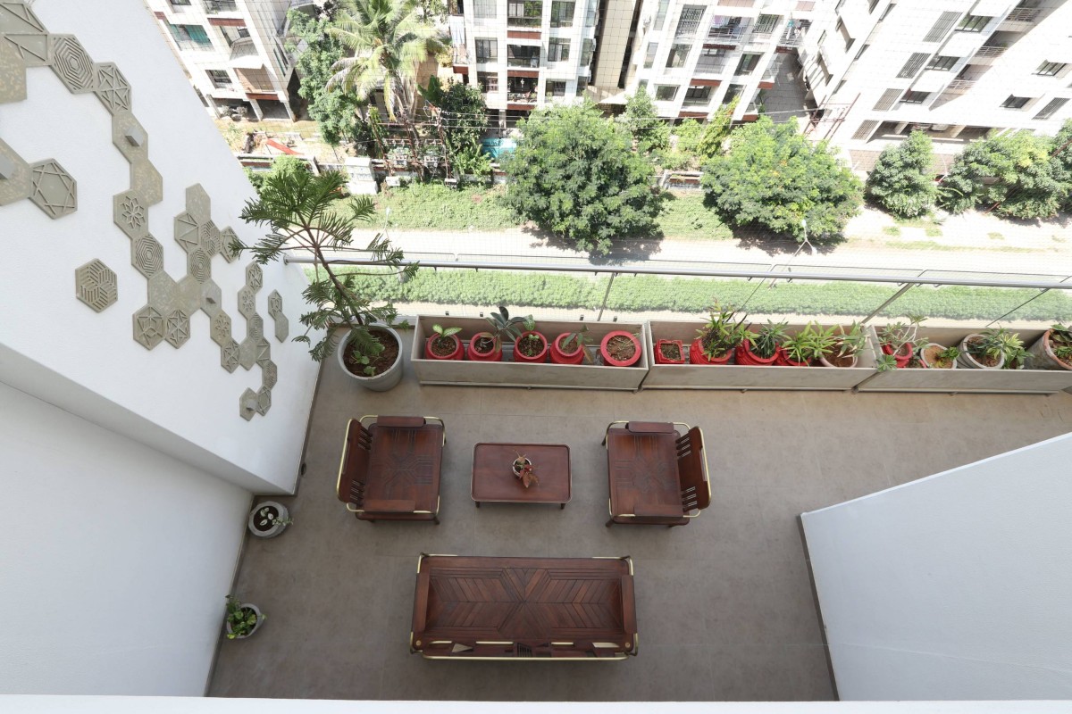Seating area at Balcony of Majestic Penthouse by DP Dimensions