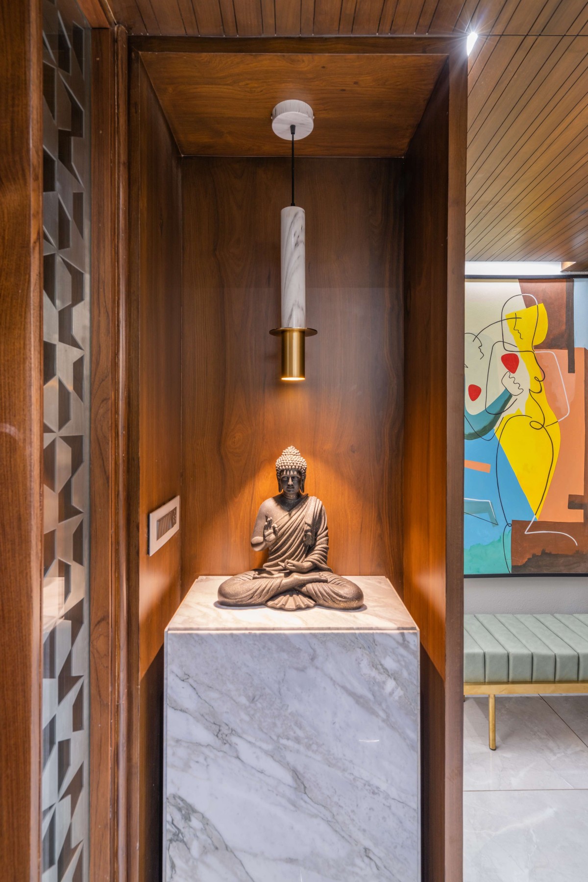 Lord Buddha's idol at entrance of An Amiable Enclave Of Sharnam 7 by Anand Patel Architects