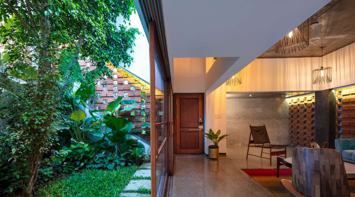 Courtyard and Living view of Inside Out House by Gaurav Roy Choudhury Architects