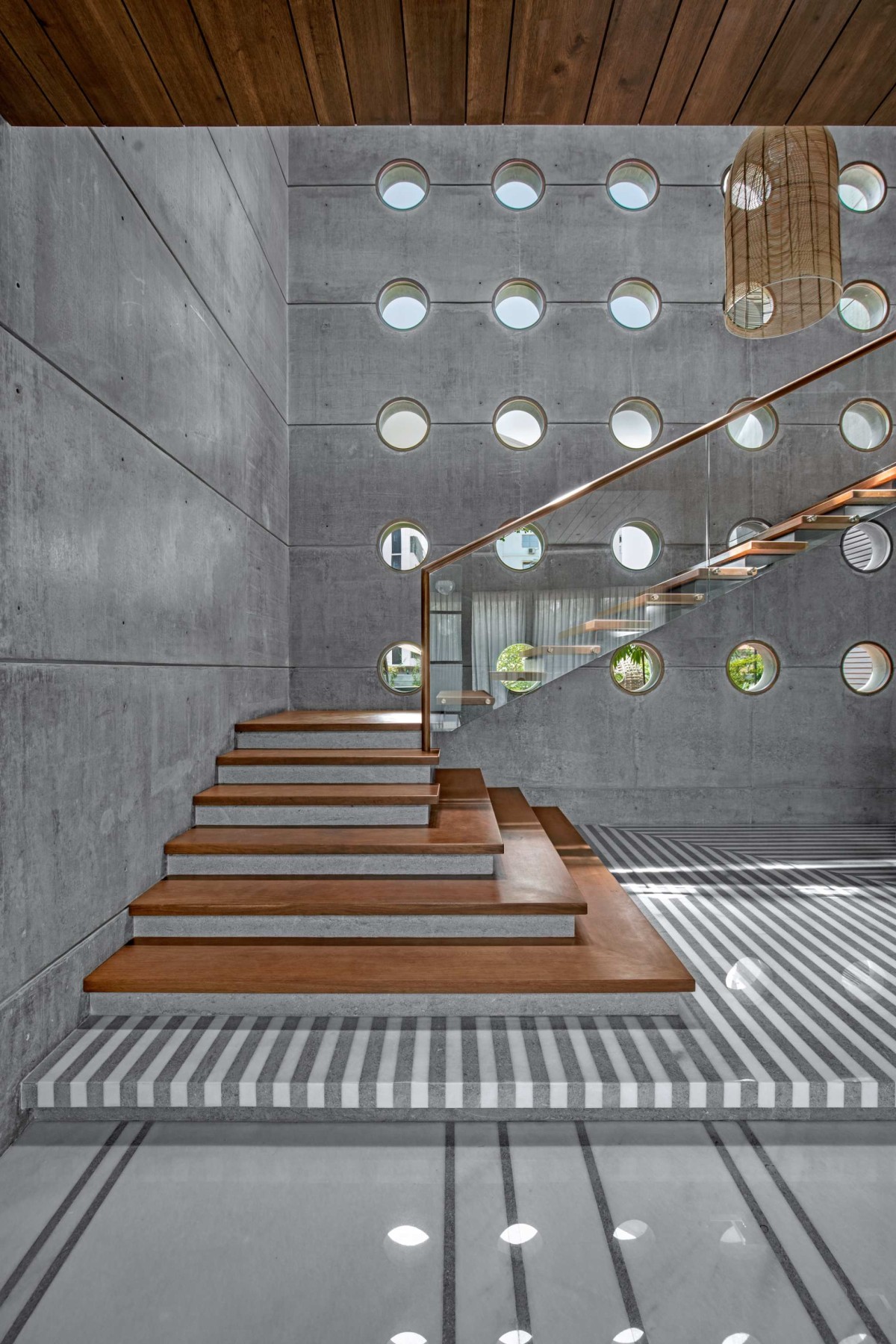 Staircase of Ankit Shah Residence by Dipen Gada & Associates