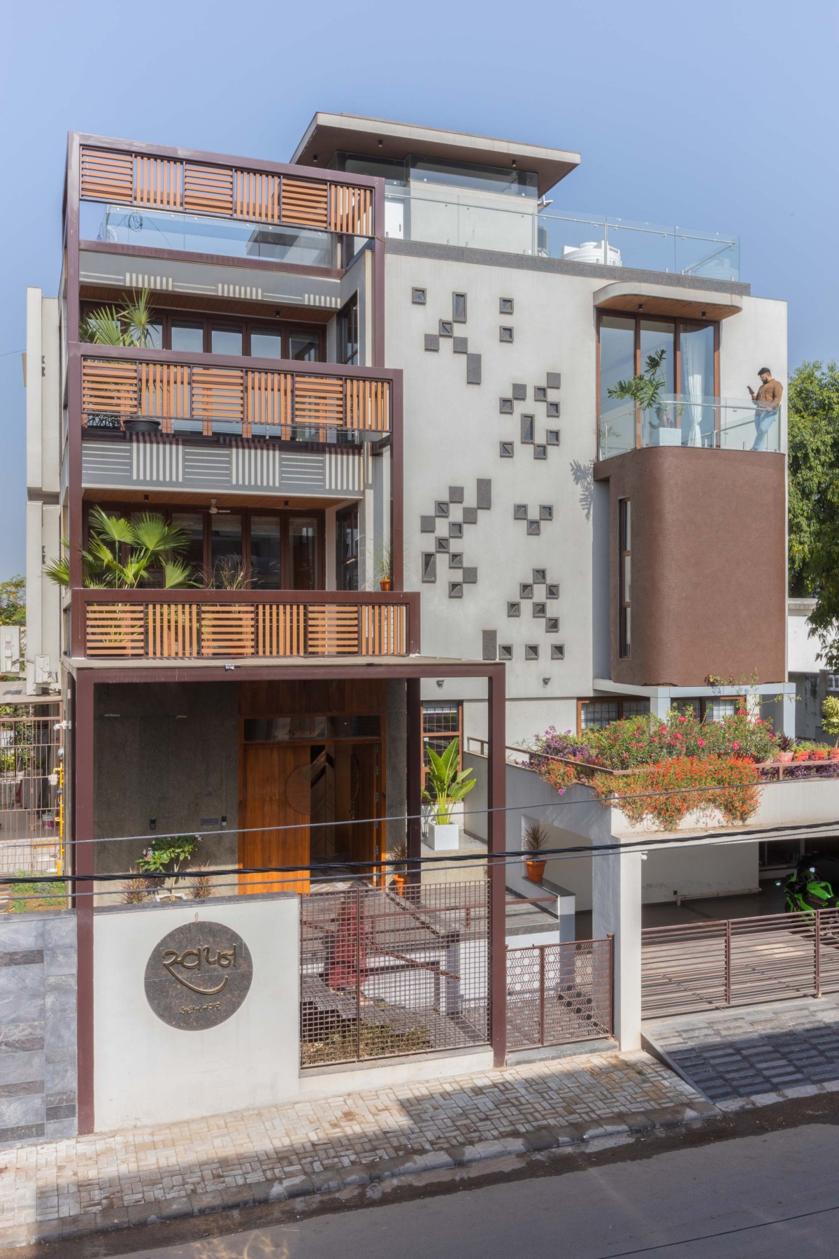 Exterior view of Swapna Residence - A Harmonious Fusion of Design and Function by Architects at Work