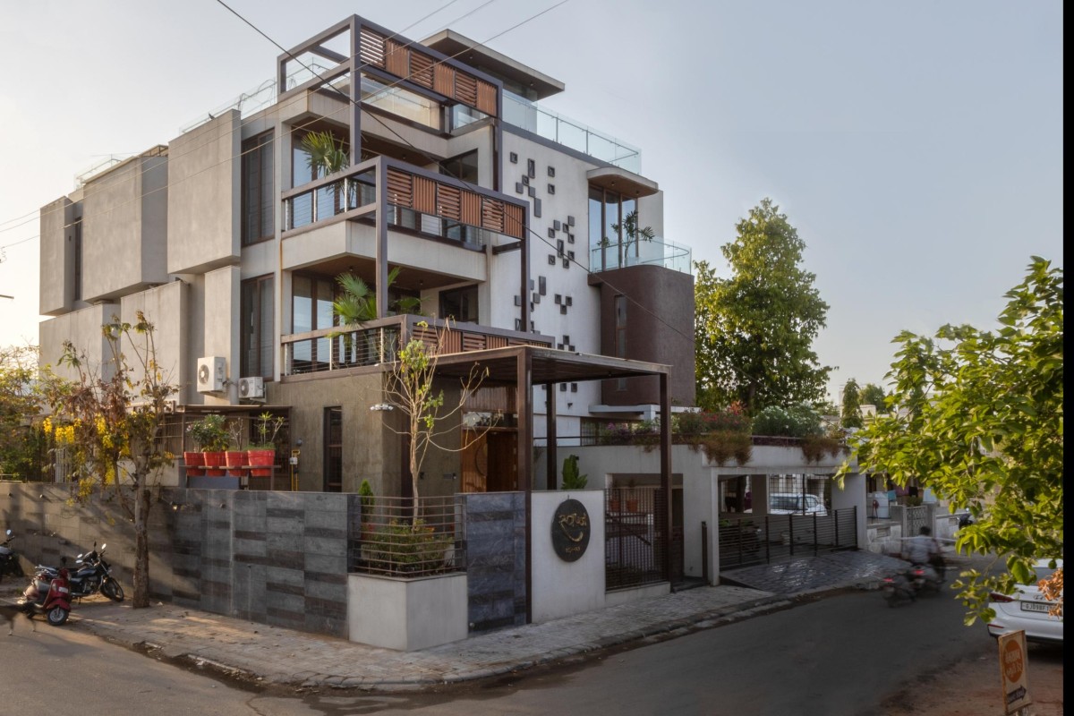 Exterior view of Swapna Residence - A Harmonious Fusion of Design and Function by Architects at Work