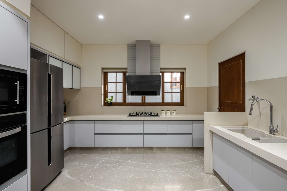 Kitchen of The Quaint Bungalow by Design Salt Studio
