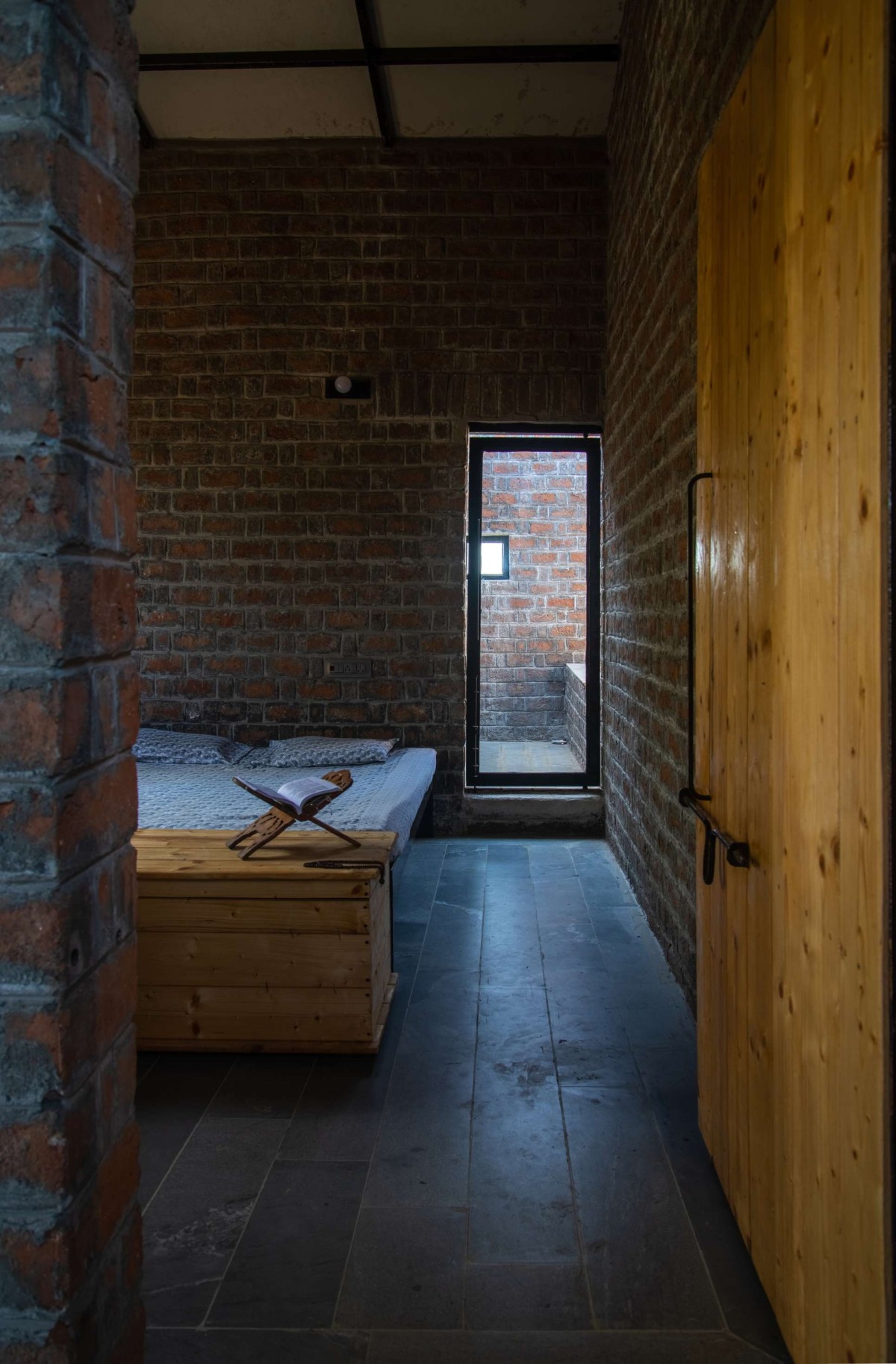 Bedroom of Half Is More – House in Progress by Atelier Shantanu Autade + Studio Boxx