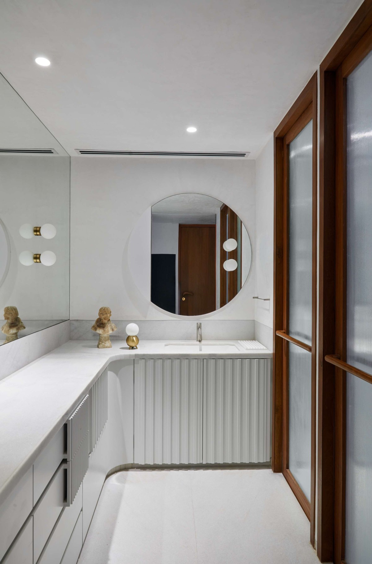 Dresser and toilet of The Zen Apartment by Atelier Varun Goyal