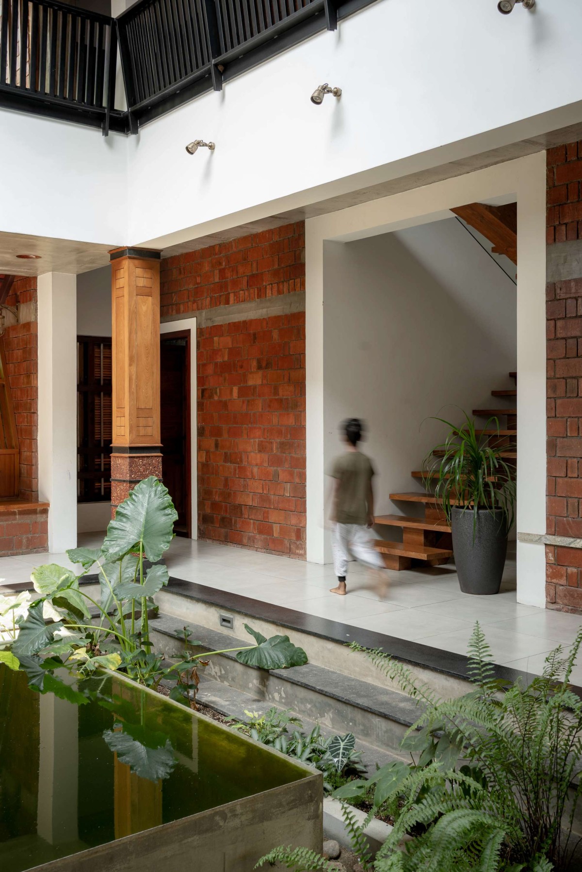 Courtyard of Earthen Penchant by Designature Architects