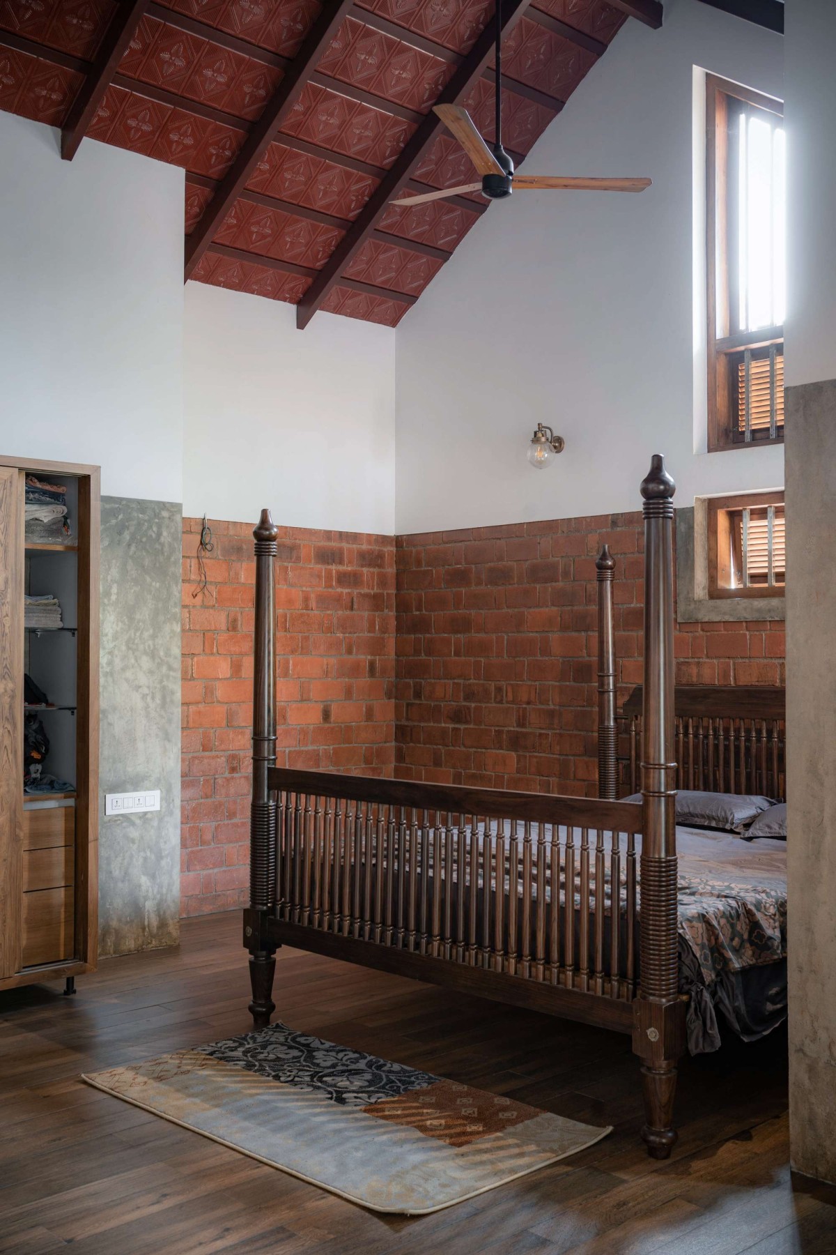 Bedroom of Earthen Penchant by Designature Architects