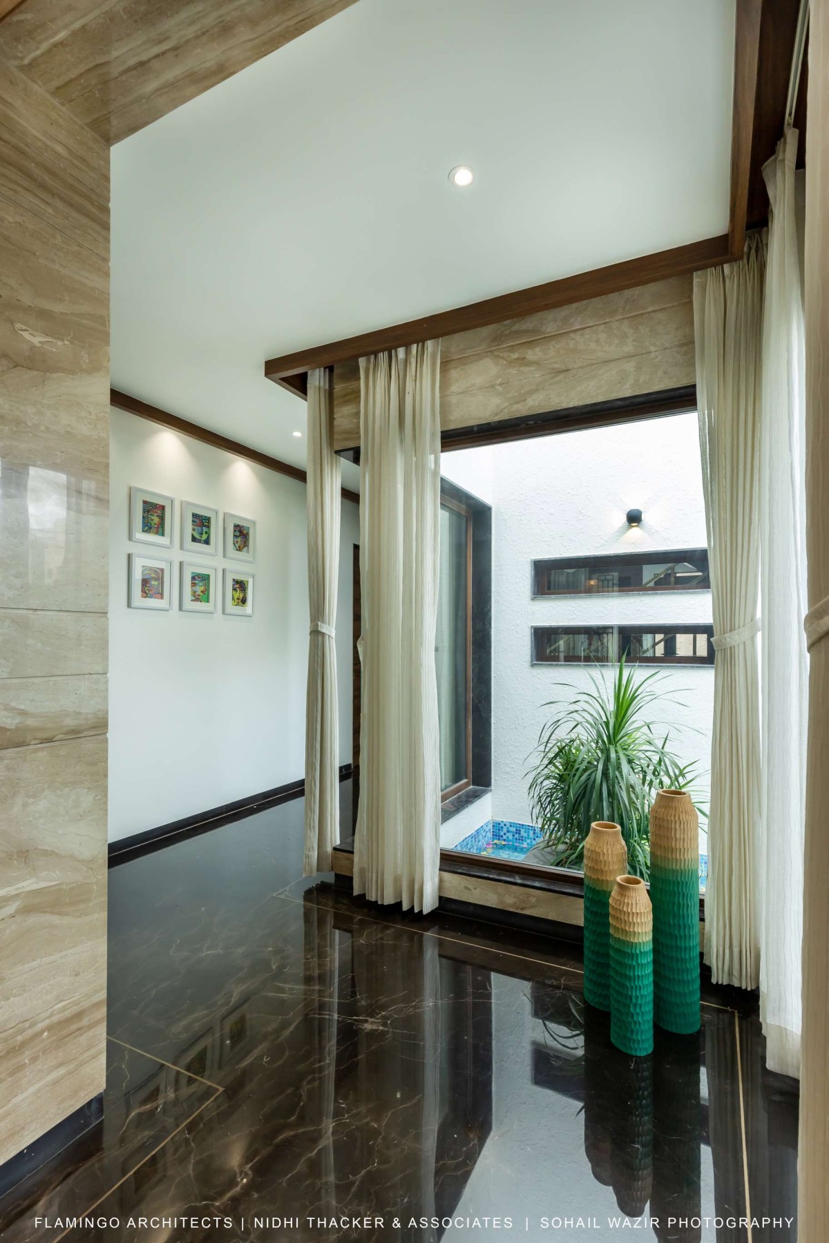Lobby of Pujara House by Flamingo Architects + Nidhi Thacker and Associates