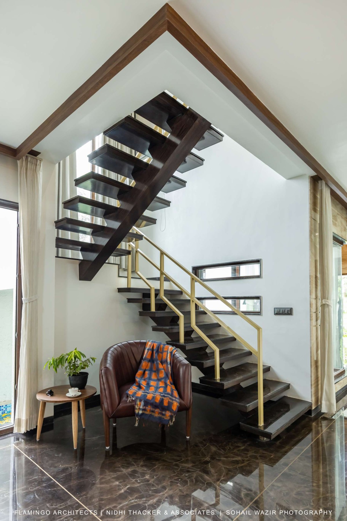 Staircase of Pujara House by Flamingo Architects + Nidhi Thacker and Associates