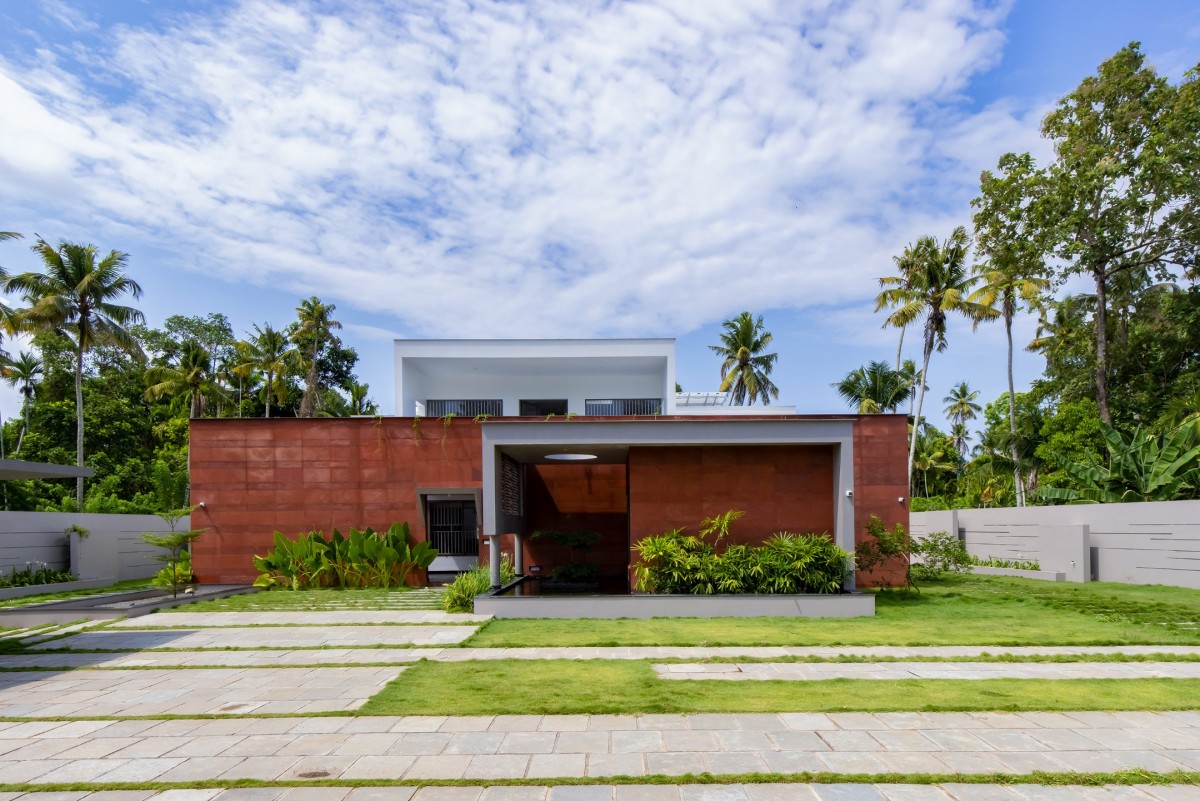 Exterior of Red Wall Residence by i2a Architects Studio