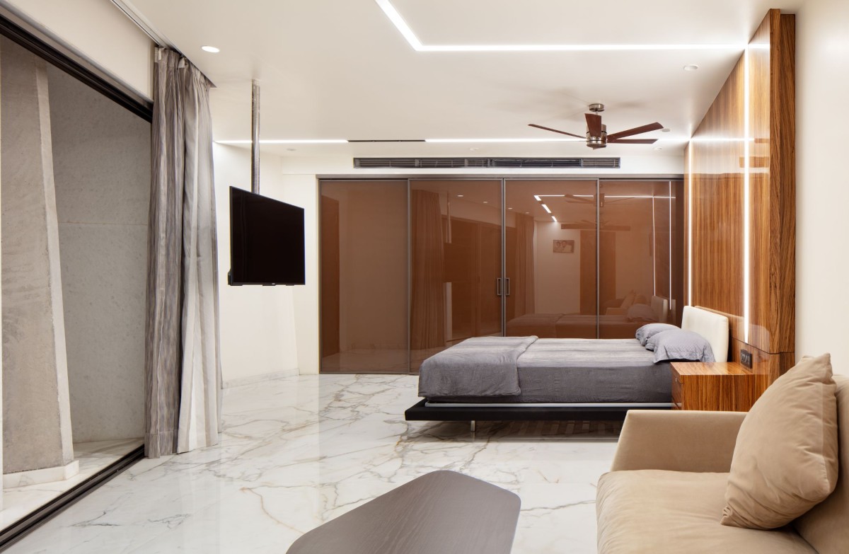 Master Bedroom at first floor of Cleft House by Anagram Architects