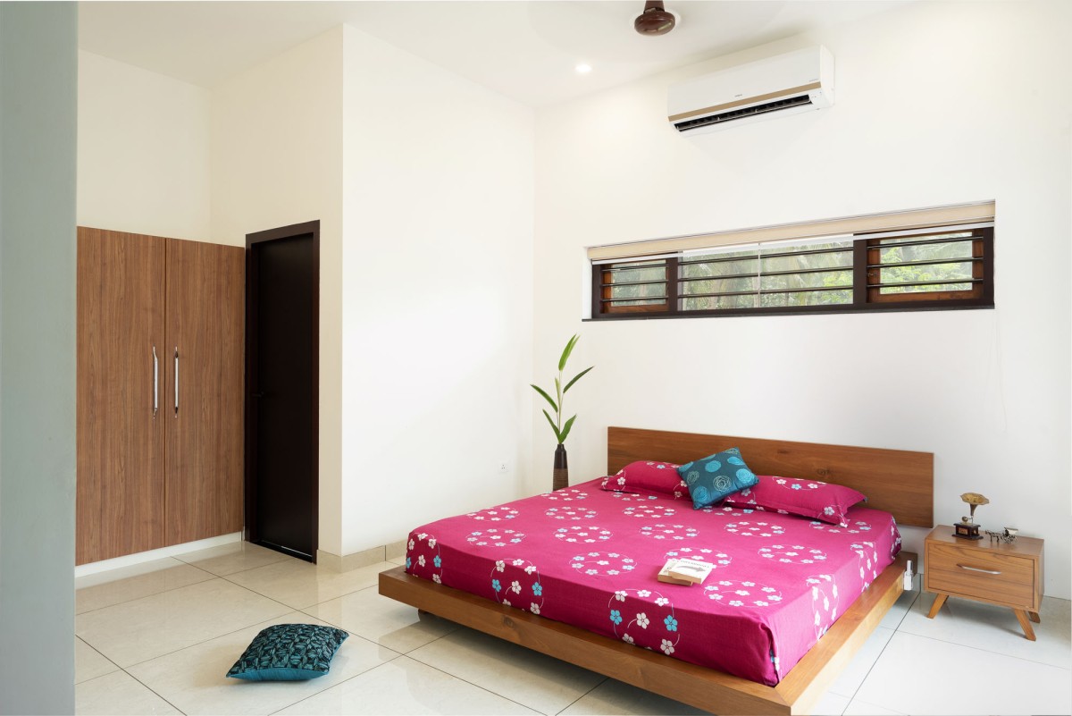 Bedroom of The Frangipani House by Designature Architects
