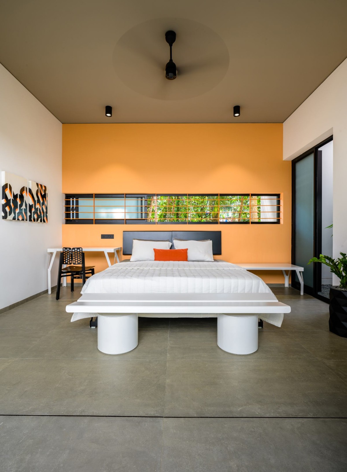 Bedroom 1 of The Colour Burst House by LIJO.RENY.architects