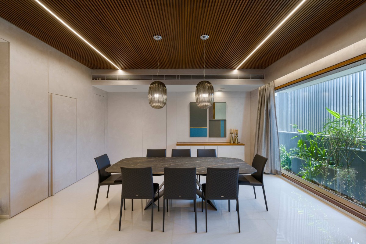 Dining room of Gauribidanur Residence by Cadence Architects