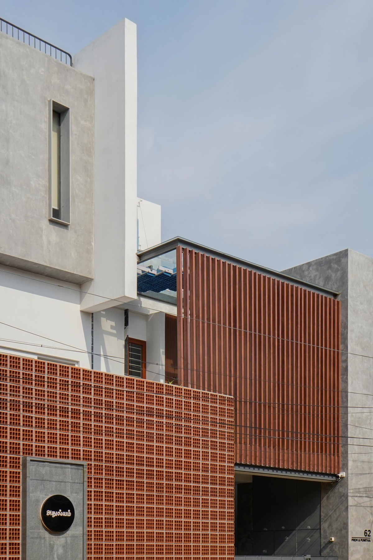 Detailed shot of exterior view of Athulyam by Outlined Architects
