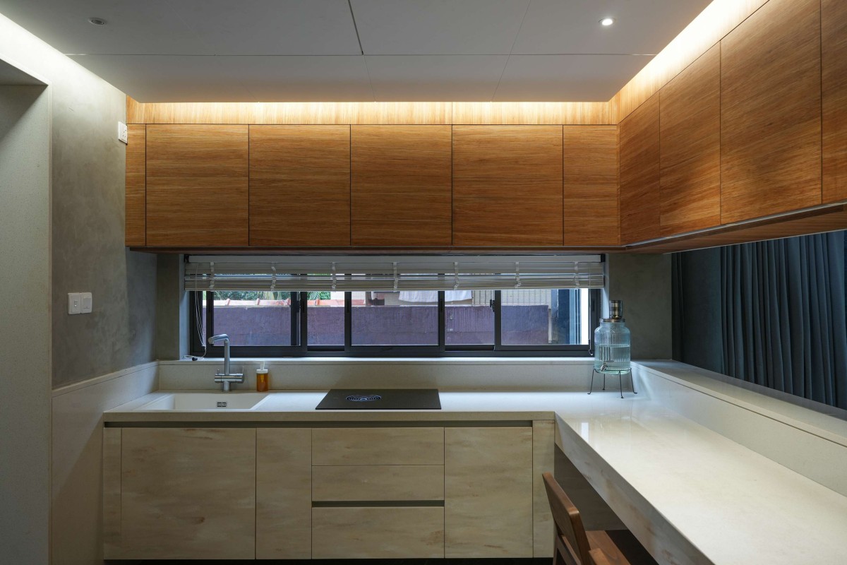 Kitchen of Sanctum of Solace by SOHO Architects