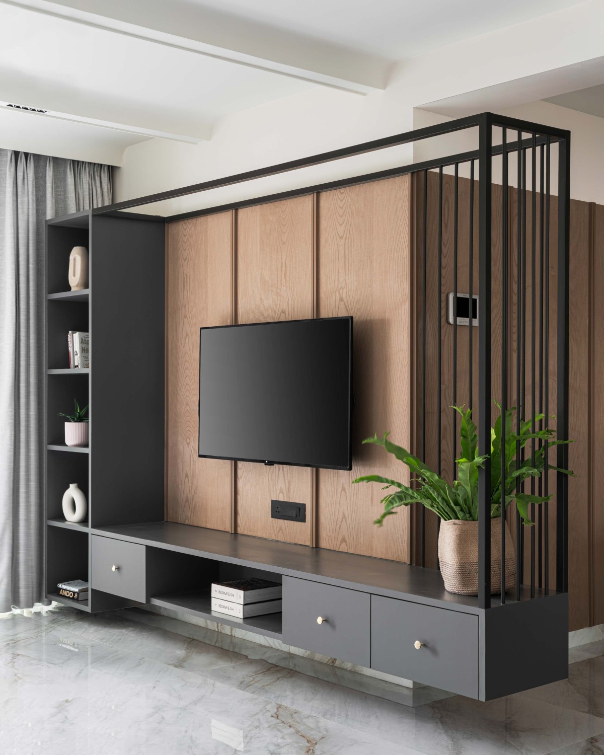 TV Unit of Tarang House by Studio Thoughts Per Meter