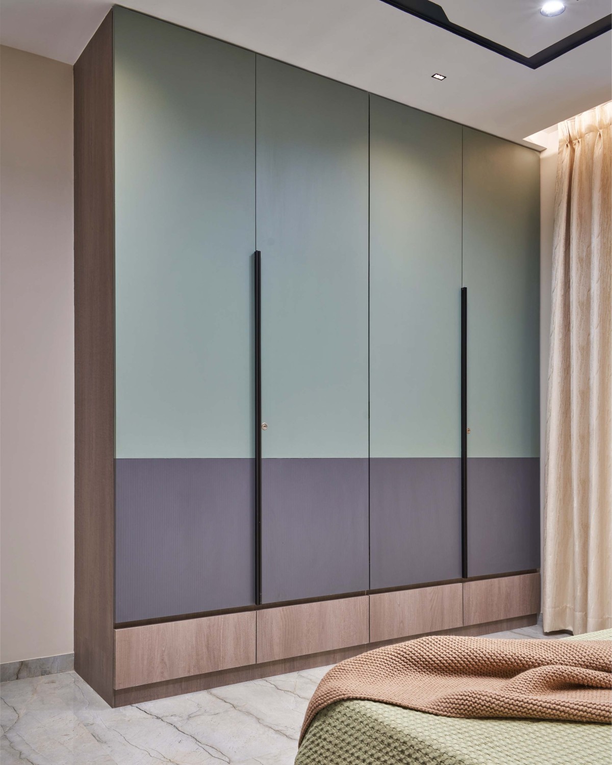 Wardrobe at Master Bedroom of Reviving Spaces by DNT Architects