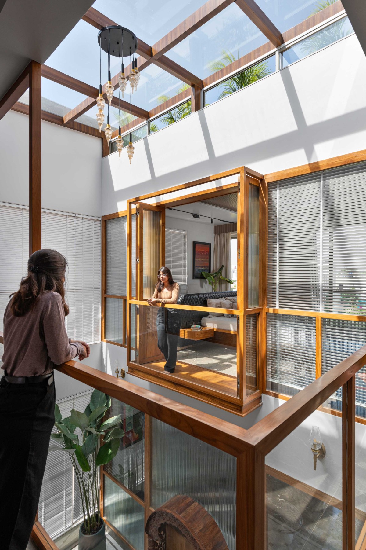Visual Connection Through Internal Courtyard of The House With No Walls by The Design Alley