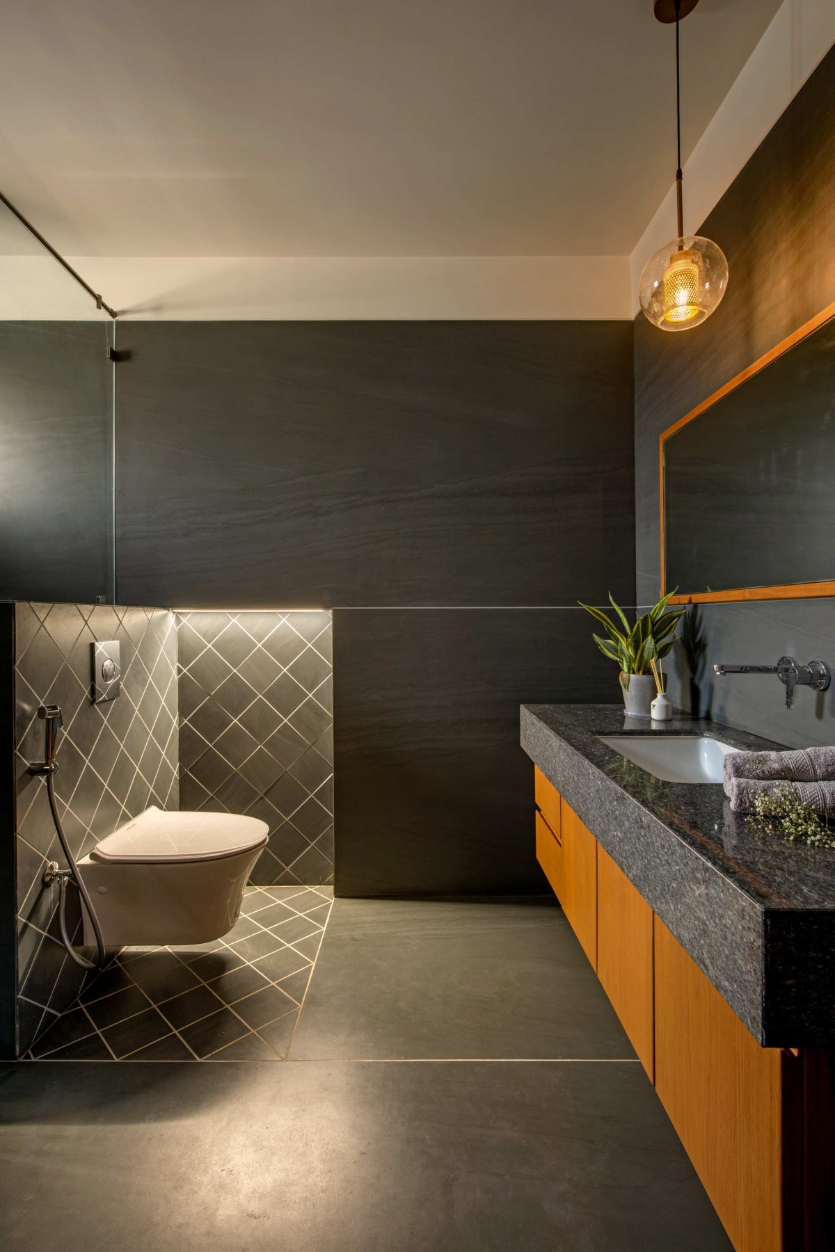 Washroom at Son's Bedroom of Royal Acre Residence by K.N. Associates