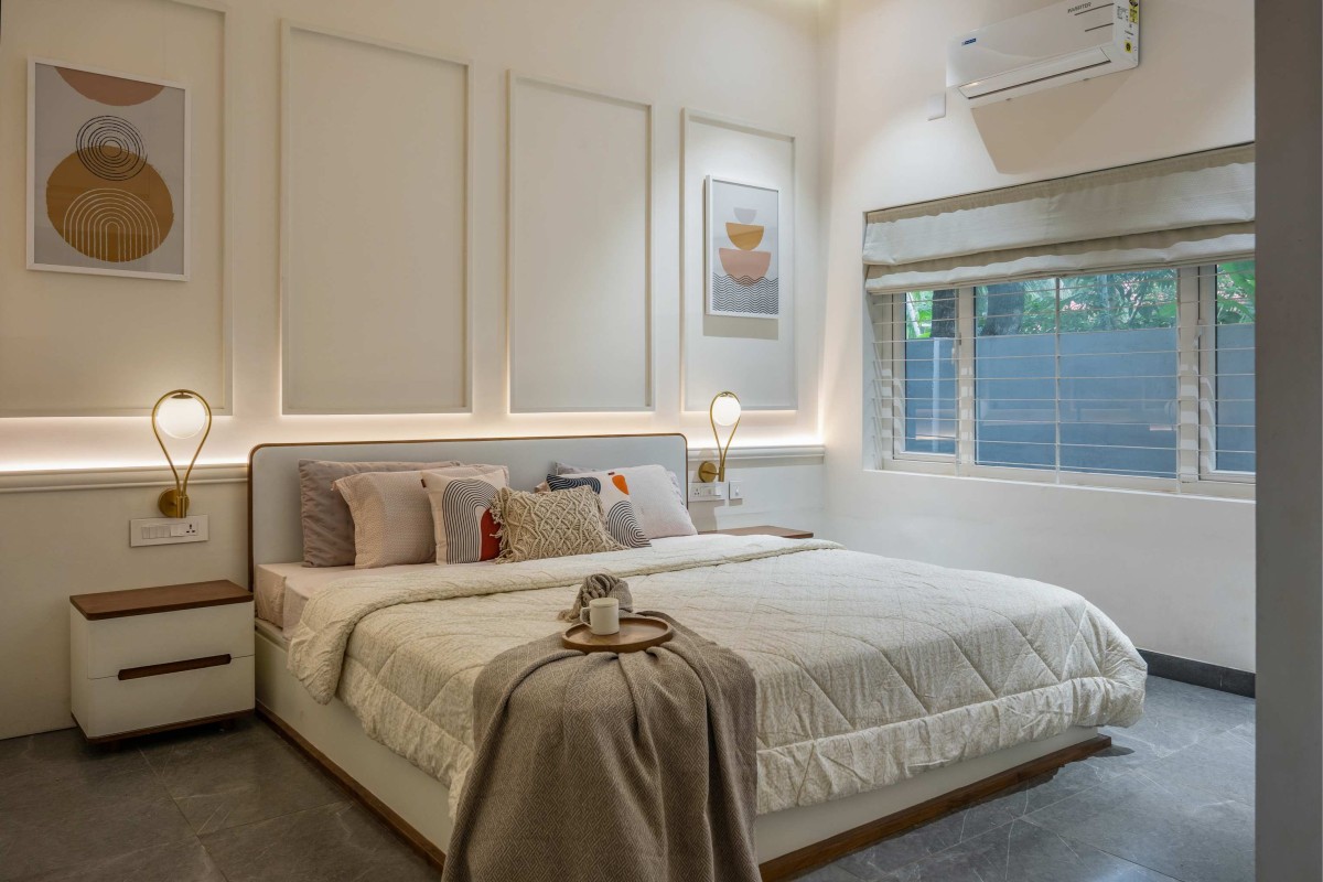 Guest bedroom of The Pravasi Home by Studio Vista Architects