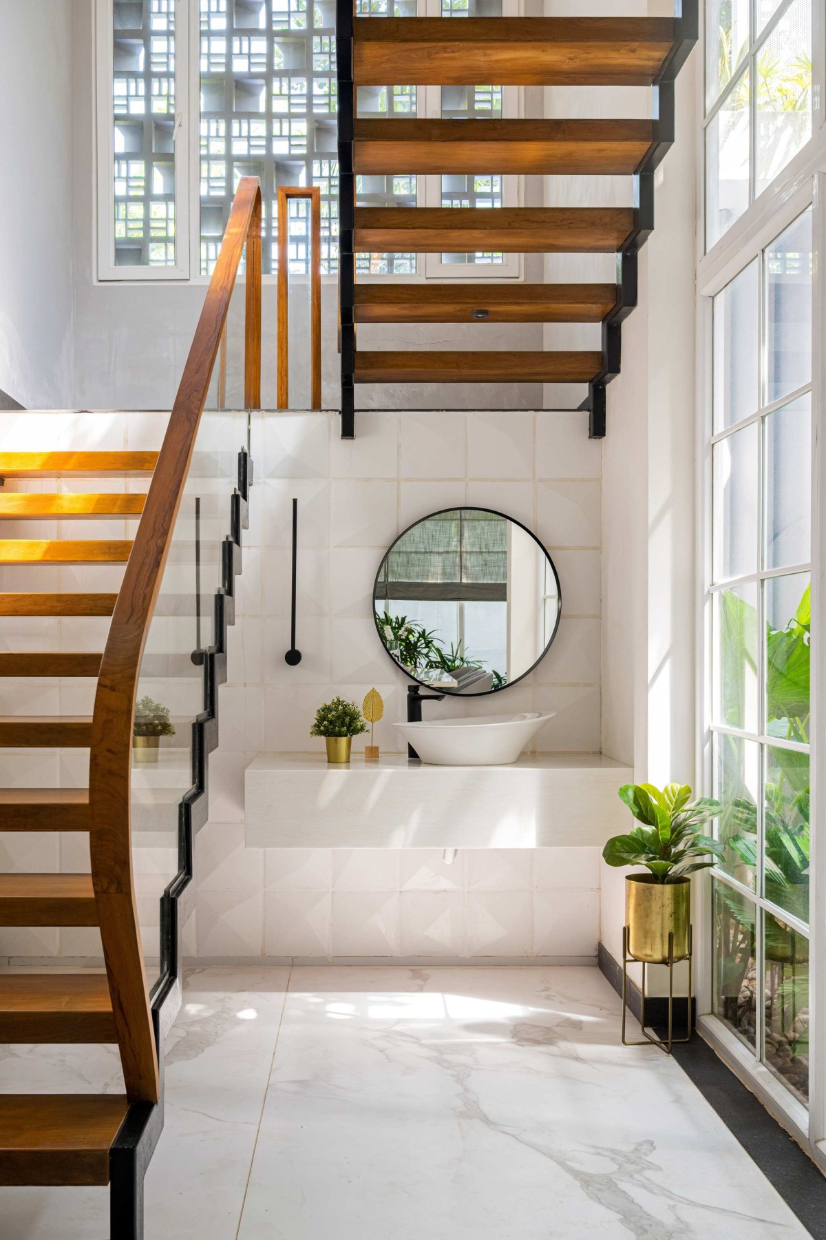 Staircase of The Pravasi Home by Studio Vista Architects