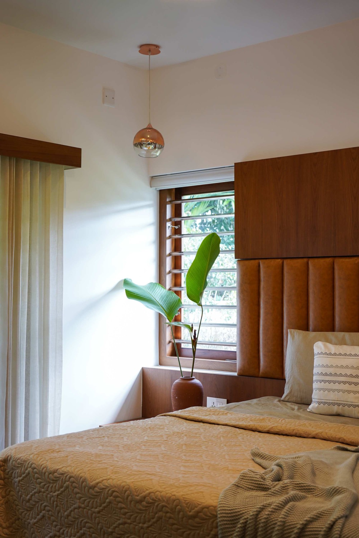 Master Bedroom of Kurumpil Gardens by Nature’s Craft Architectural Studio