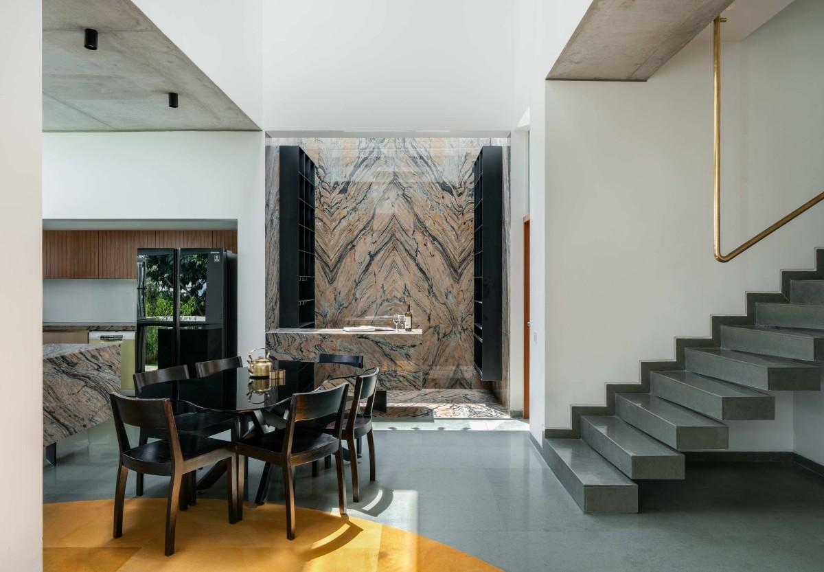 Dining and Staircase of Joshi House by Anahata Architects