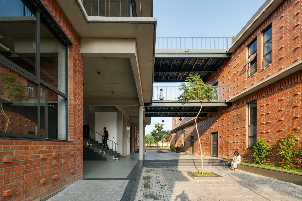 East Facing Central Spine and Courtyard entry of NSB by HabitArt Architecture Studio