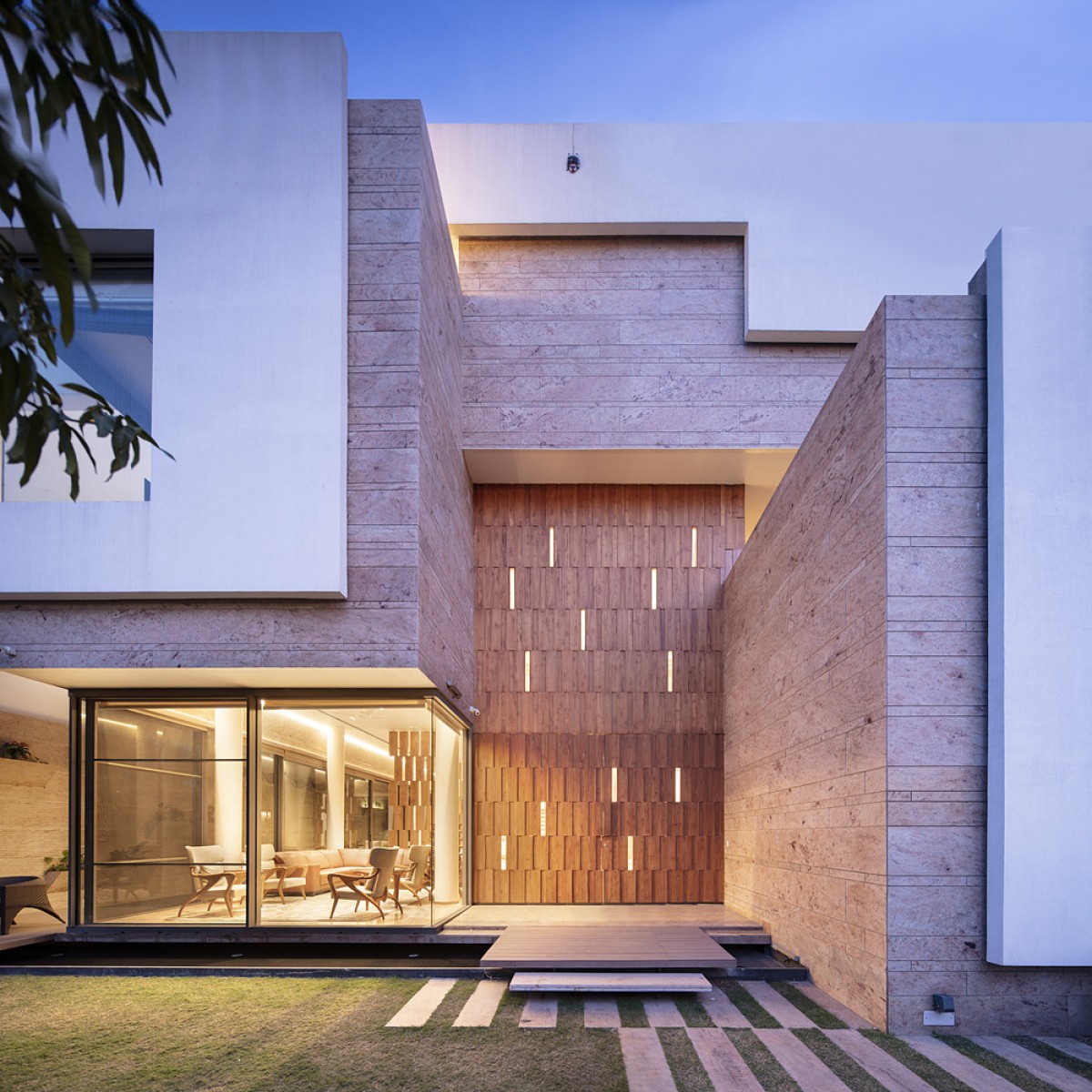 Dusk light exterior view of Residence 35 by Charged Voids