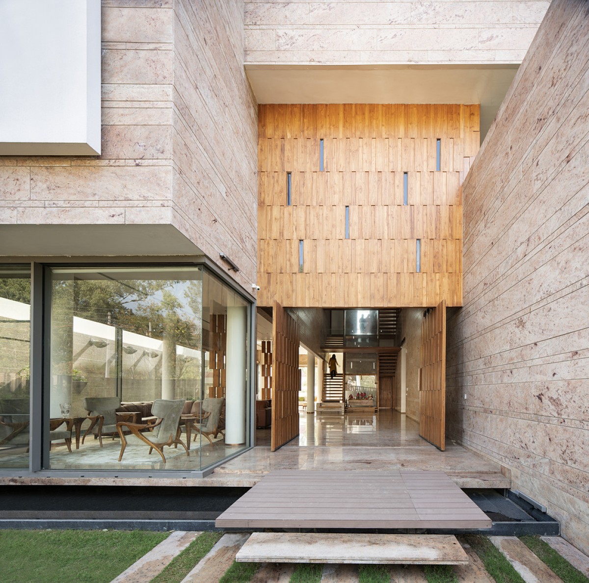 Wooden Deck at entrance of Residence 35 by Charged Voids