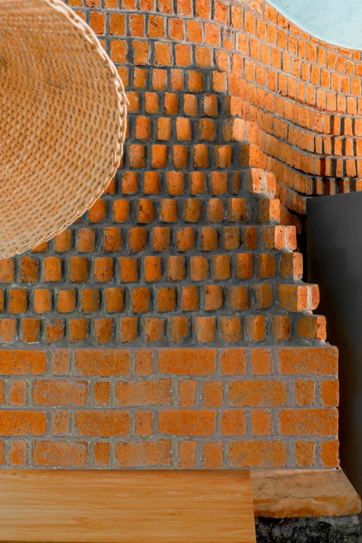 Detailed shot of brick wall of Asmalay by Blurring Boundaries