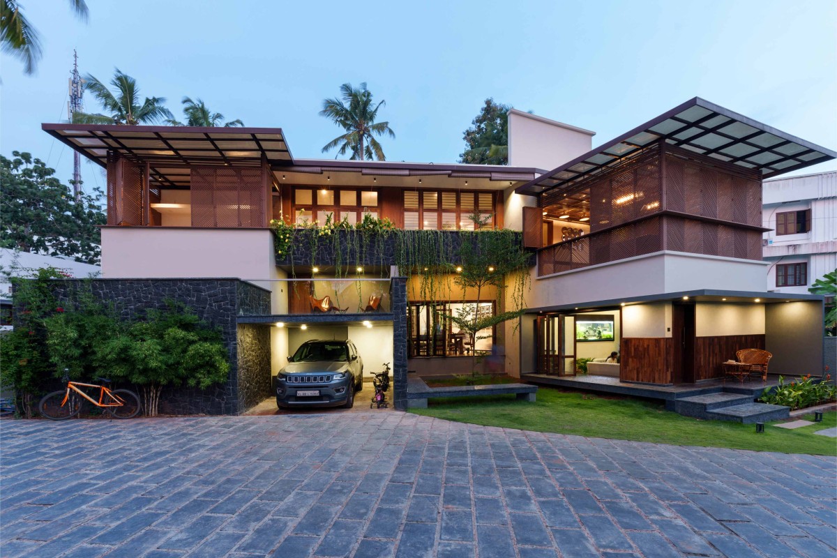 Dusk light exterior view of AANANDHAM – The house of bliss by Urbane Ivy