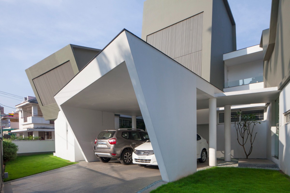 Parking of The Skewed House by LIJO.RENY.architects
