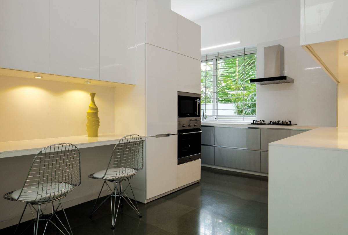 Kitchen of The Skewed House by LIJO.RENY.architects