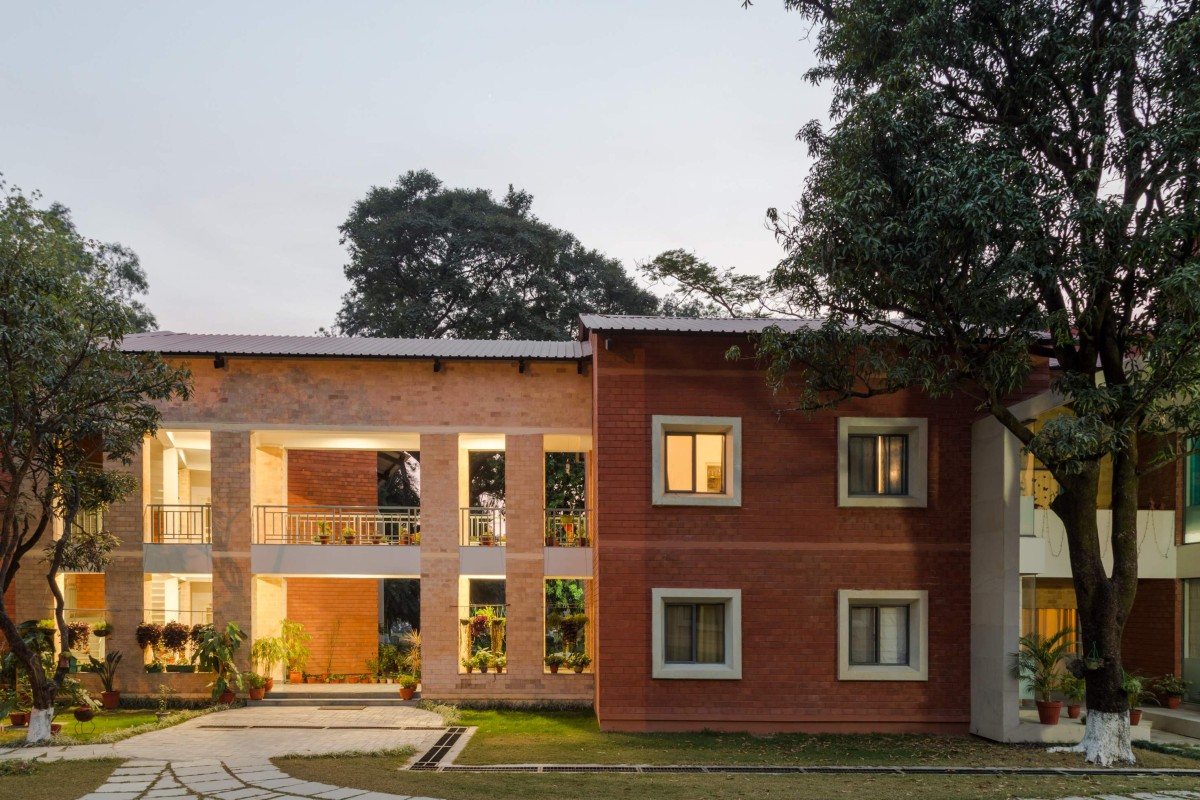 Dusk light shot of extierior view pf Teacher's Residences at The Doon School by Anagram Architects