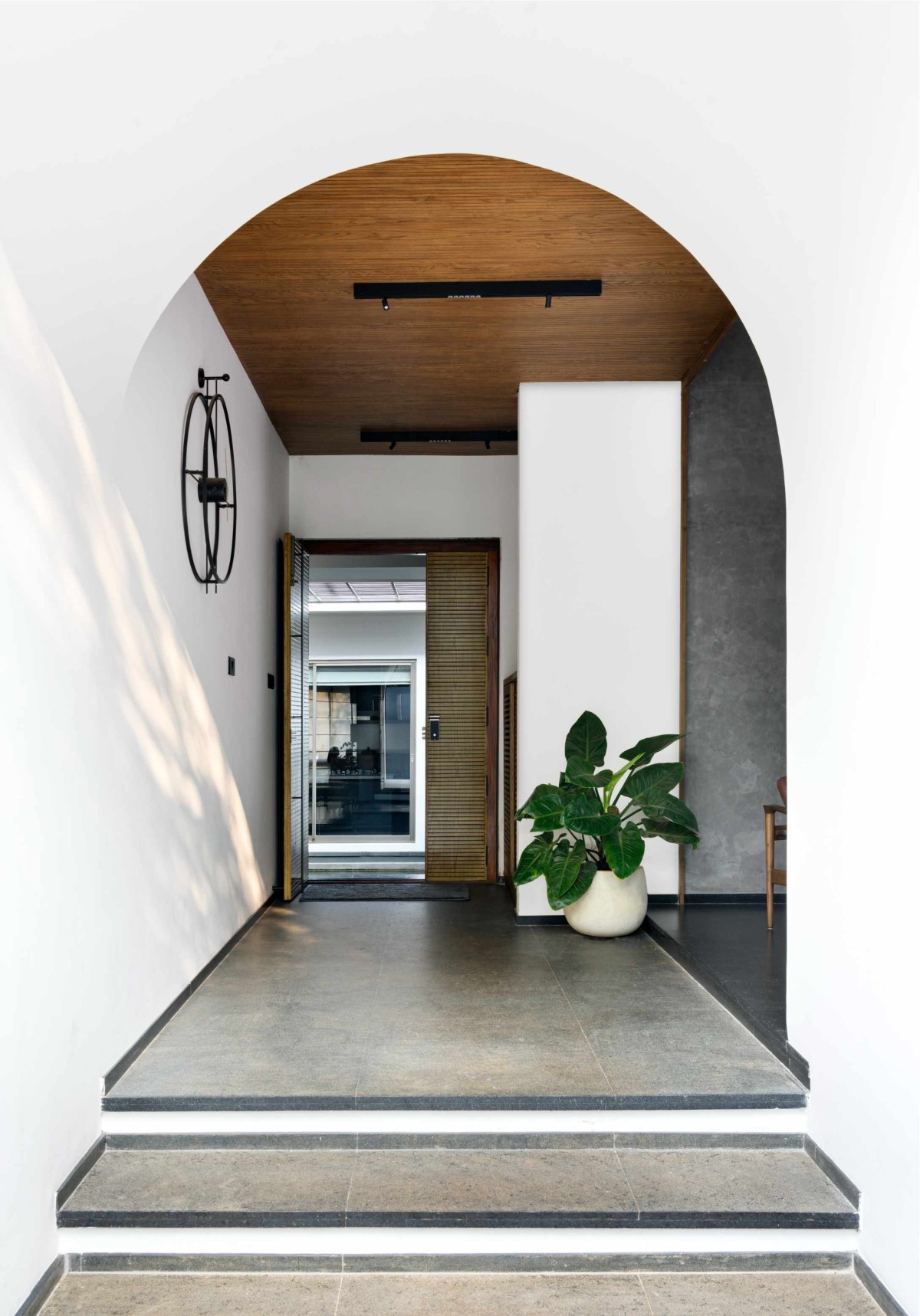 Entrance lobby of The Hidden House by Aslam Sham Architects